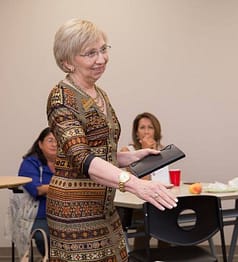 Donna Woolam Standing Teaching